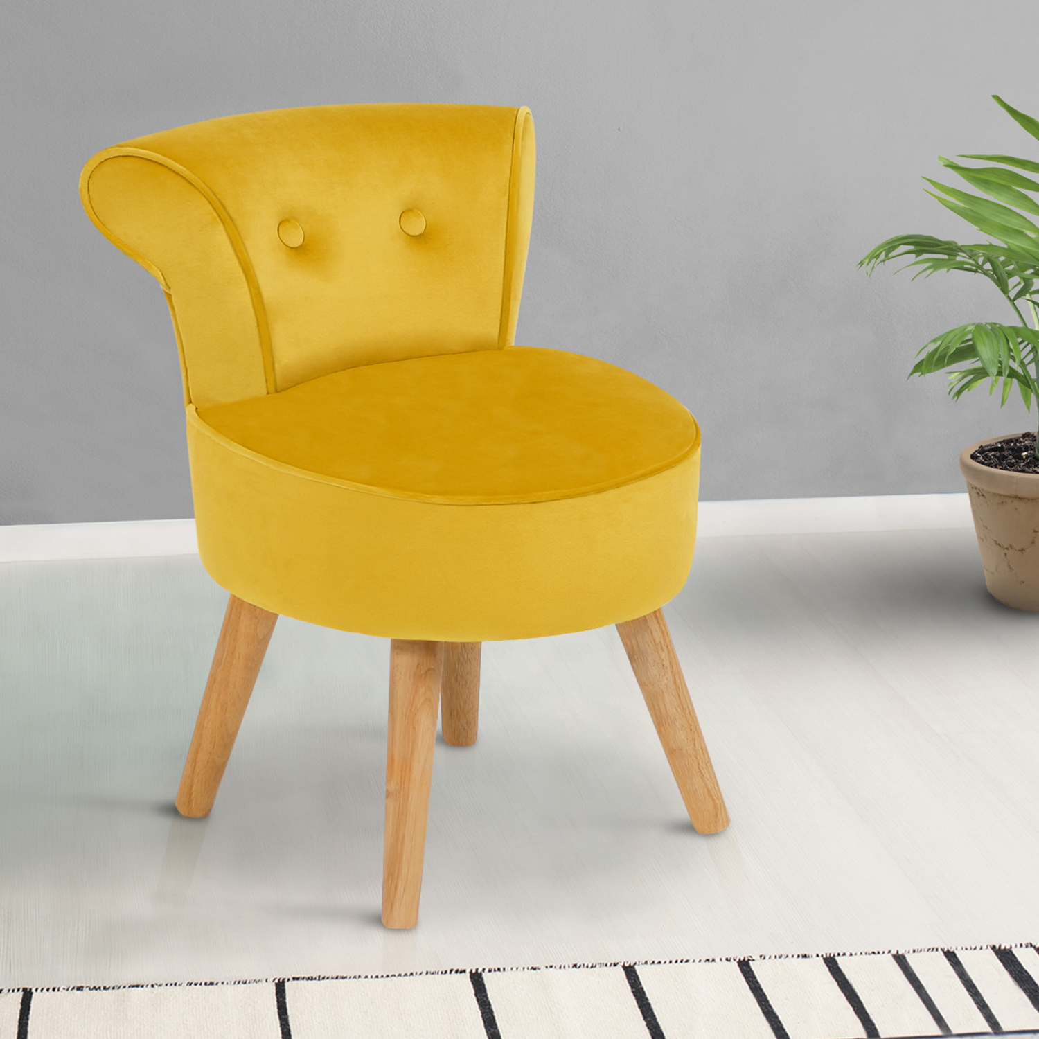 Petit fauteuil crapaud jaune en velours