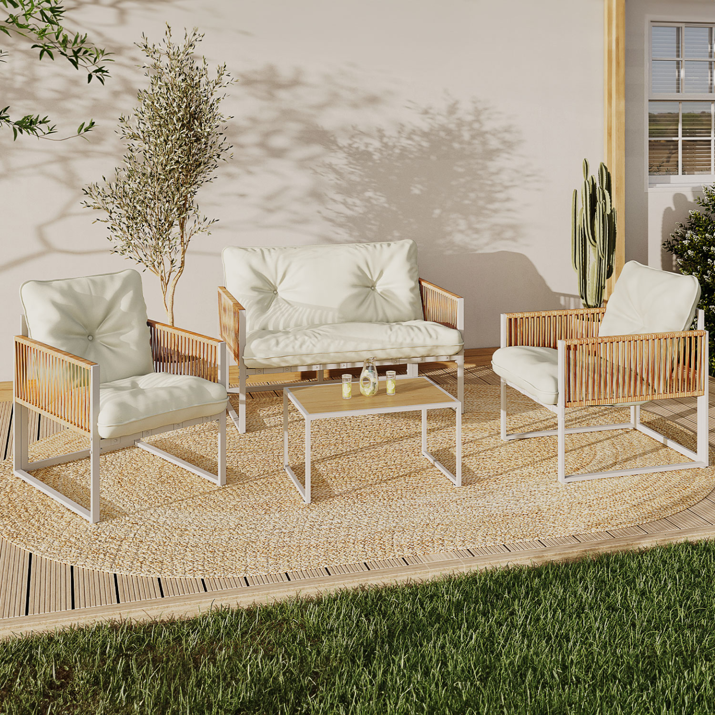 Salon de jardin bas RIO 4 places IdMarket avec structure en métal blanc, habillage en cordage effet rotin clair et coussins beiges, installé sur une terrasse en bois.