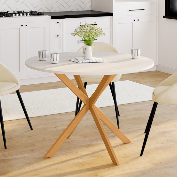 Table à manger ronde GISELE 4-6 personnes pied araignée bois plateau blanc 110 cm Table à manger ronde GISELE 4-6 personnes pied araignée bois plateau blanc 110 cm