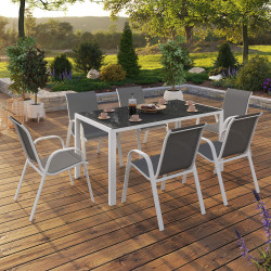 15743 - Set di mobili da giardino a 6 posti con tavolo in vetro temperato e sedie impilabili Set di mobili da giardino a 6 posti con tavolo in vetro temperato e sedie bianche e grigie - MADRID | ID Market