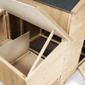 Le chalet XL IDMarket : un refuge spacieux pour vos poules au cœur du potager