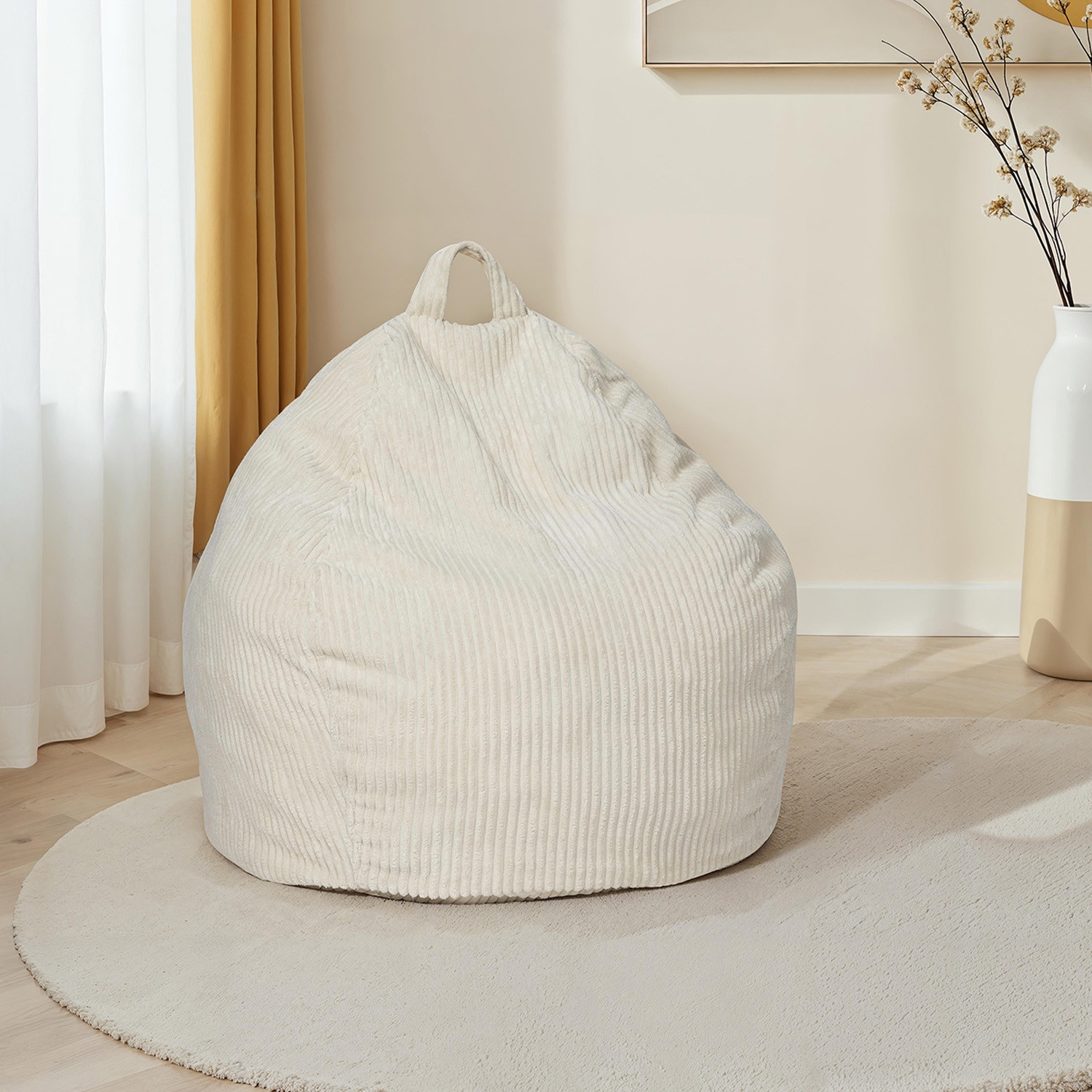 Fauteuil poire gros pouf en velours côtelé beige