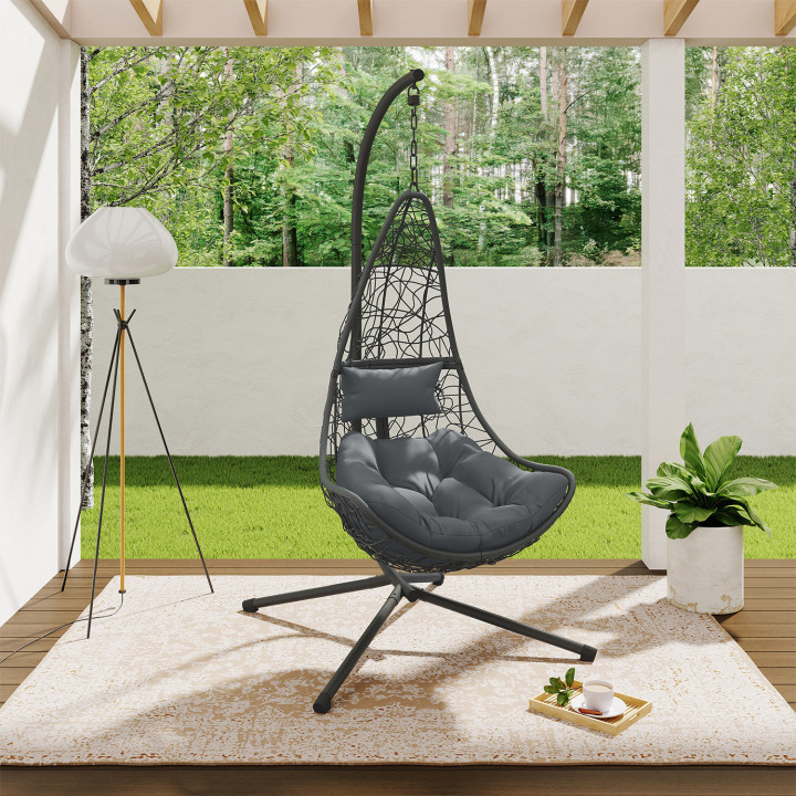 Fauteuil courbé suspendu ajouré effet rotin gris avec coussin gris